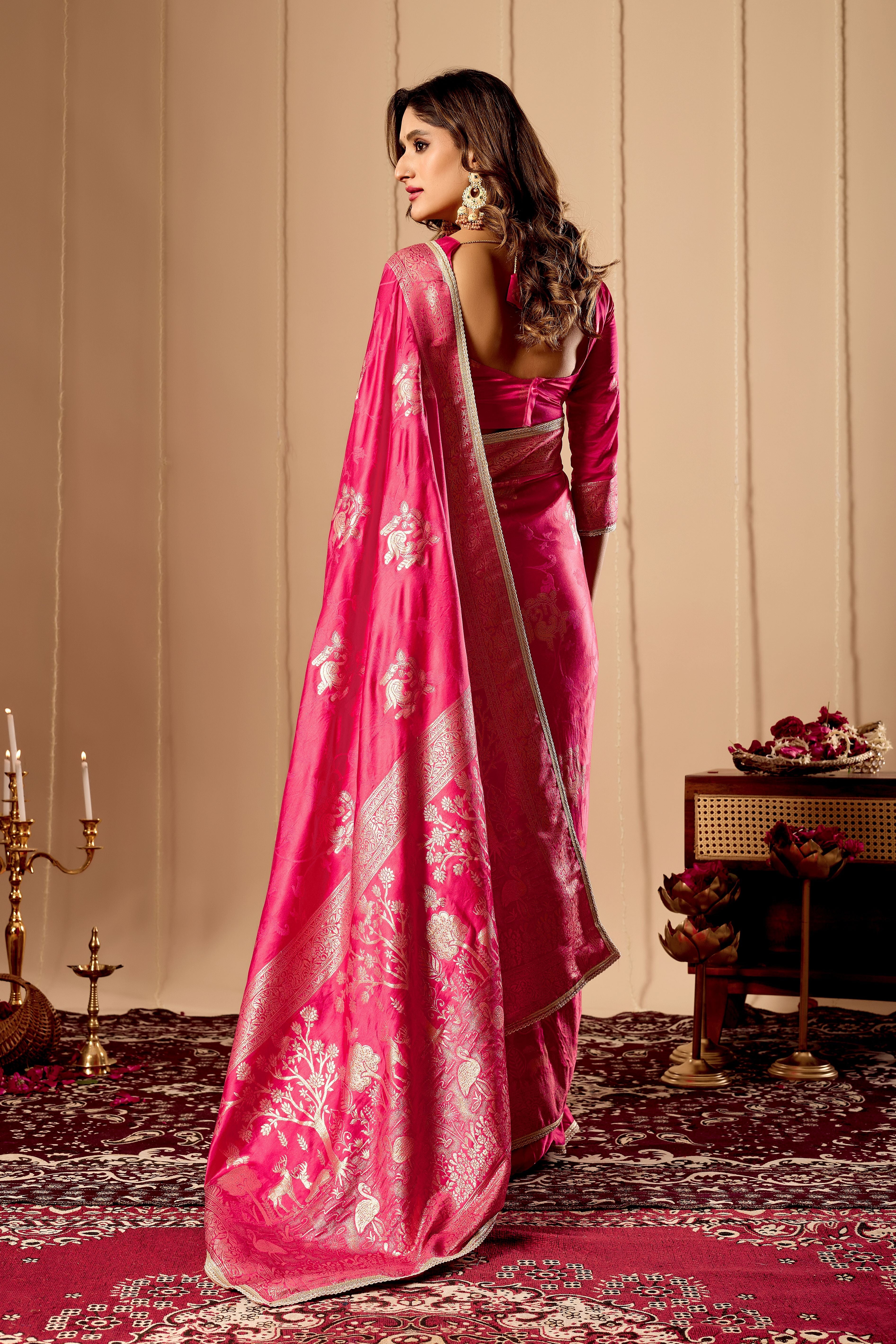 Vibrant Rani Pink satin Silk Saree with Rich Gold Zari Weaving and Elegant Traditional Motifs