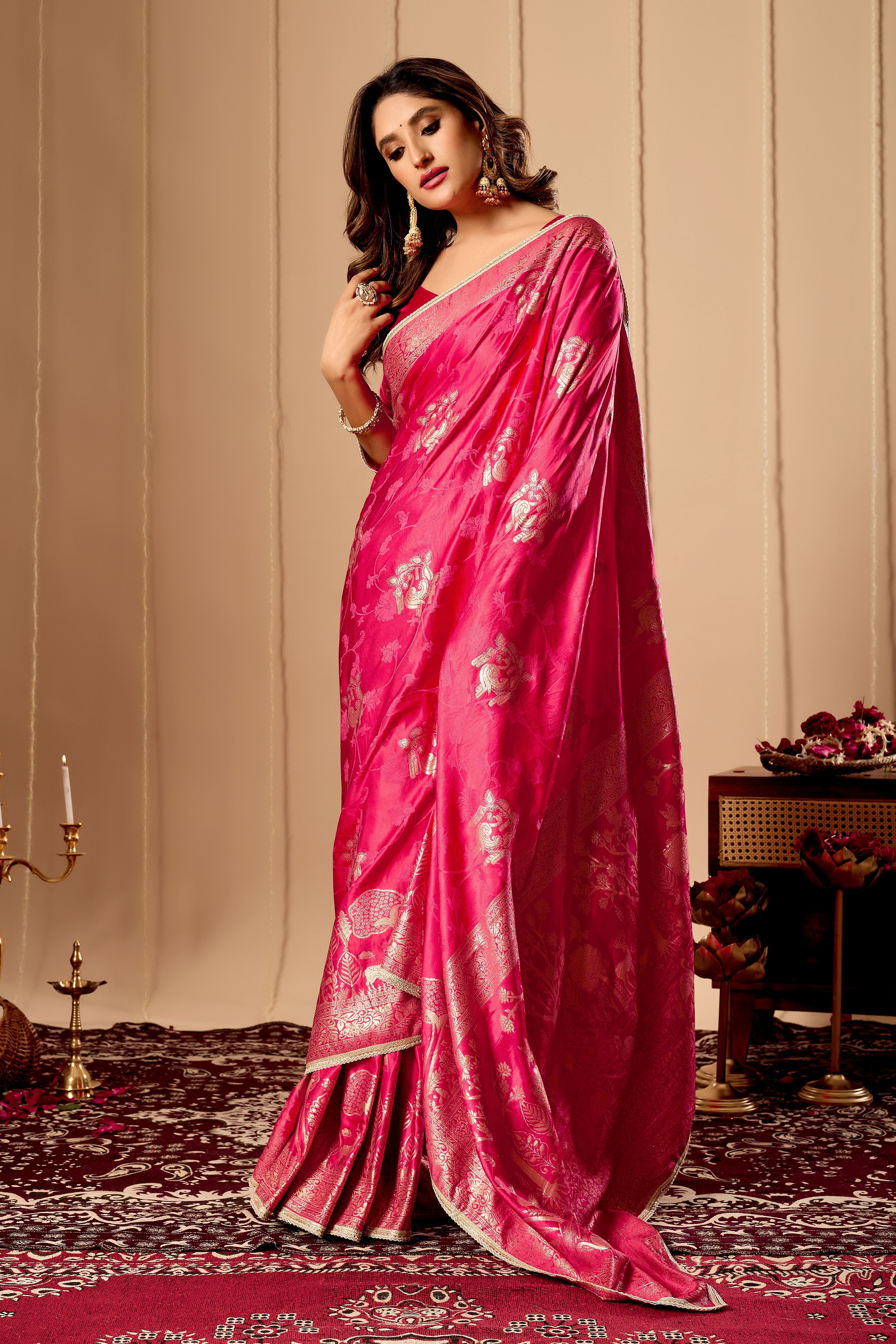Vibrant Rani Pink satin Silk Saree with Rich Gold Zari Weaving and Elegant Traditional Motifs