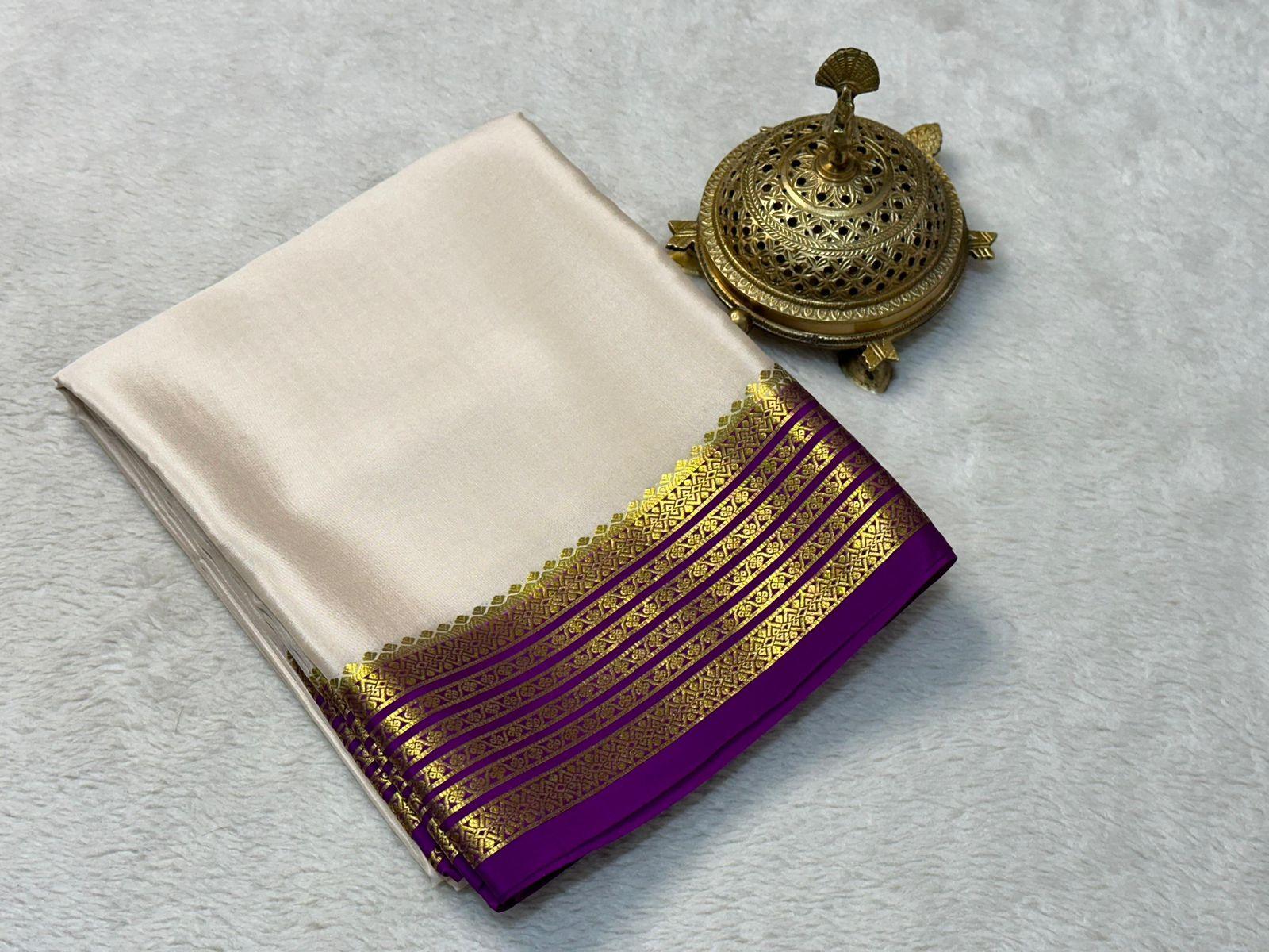 Golden Radiance: Mysore Silk Saree with Zari-Laden Borders