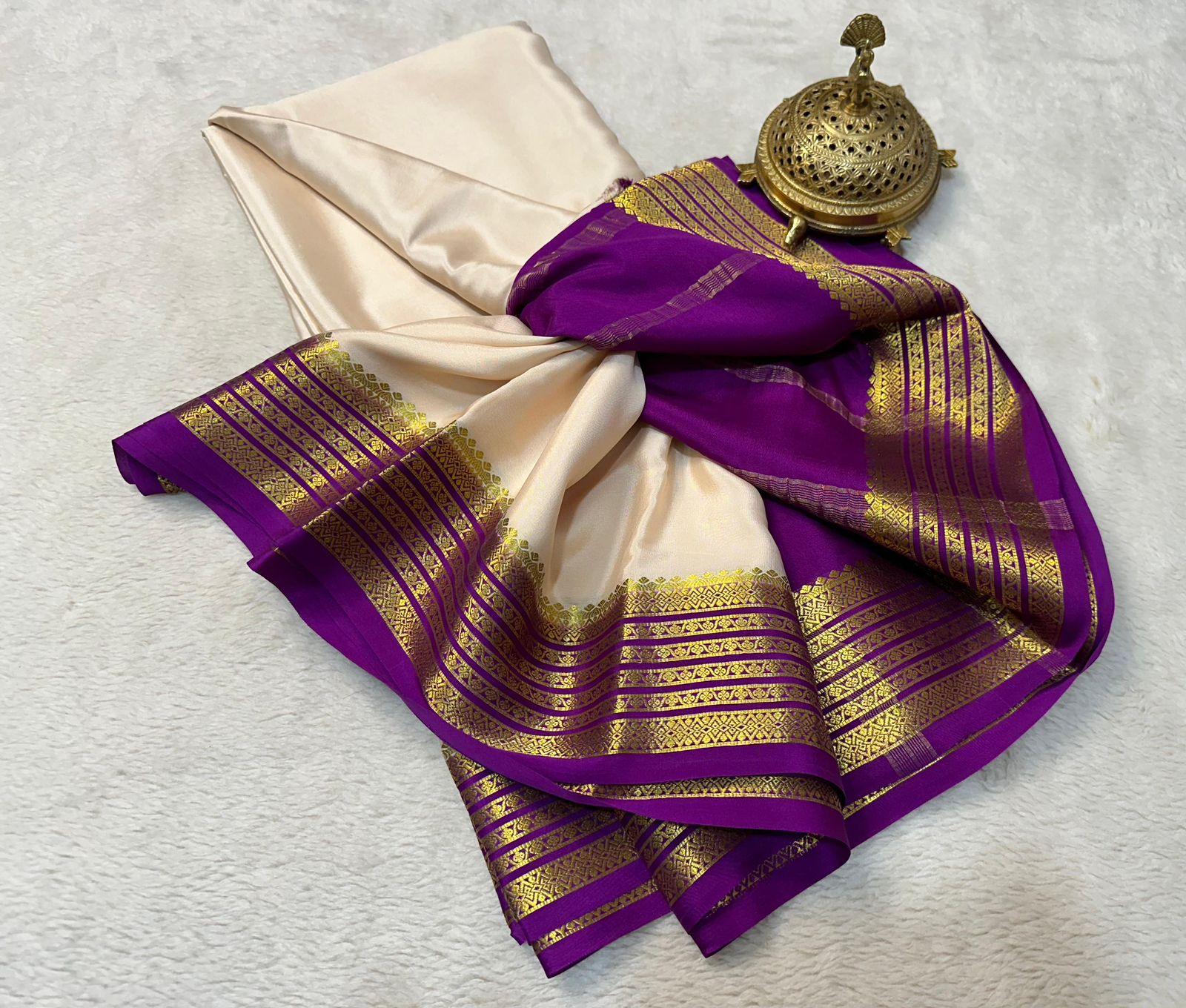Golden Radiance: Mysore Silk Saree with Zari-Laden Borders