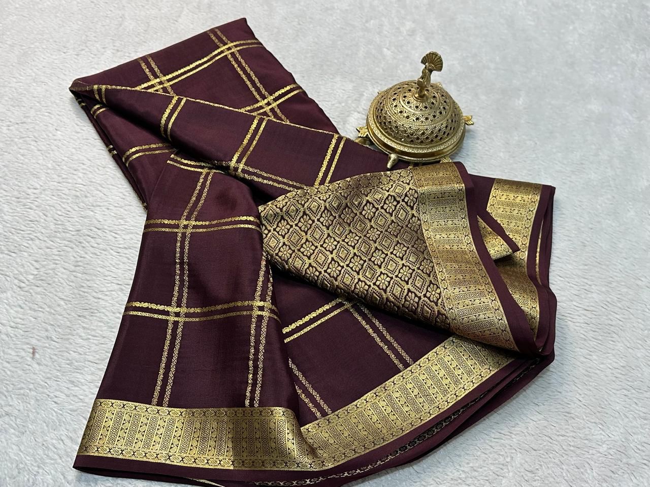 Classic Traditional Sarees: Exquisite Solid Hues with Grand Checks, Borders, and Pallus