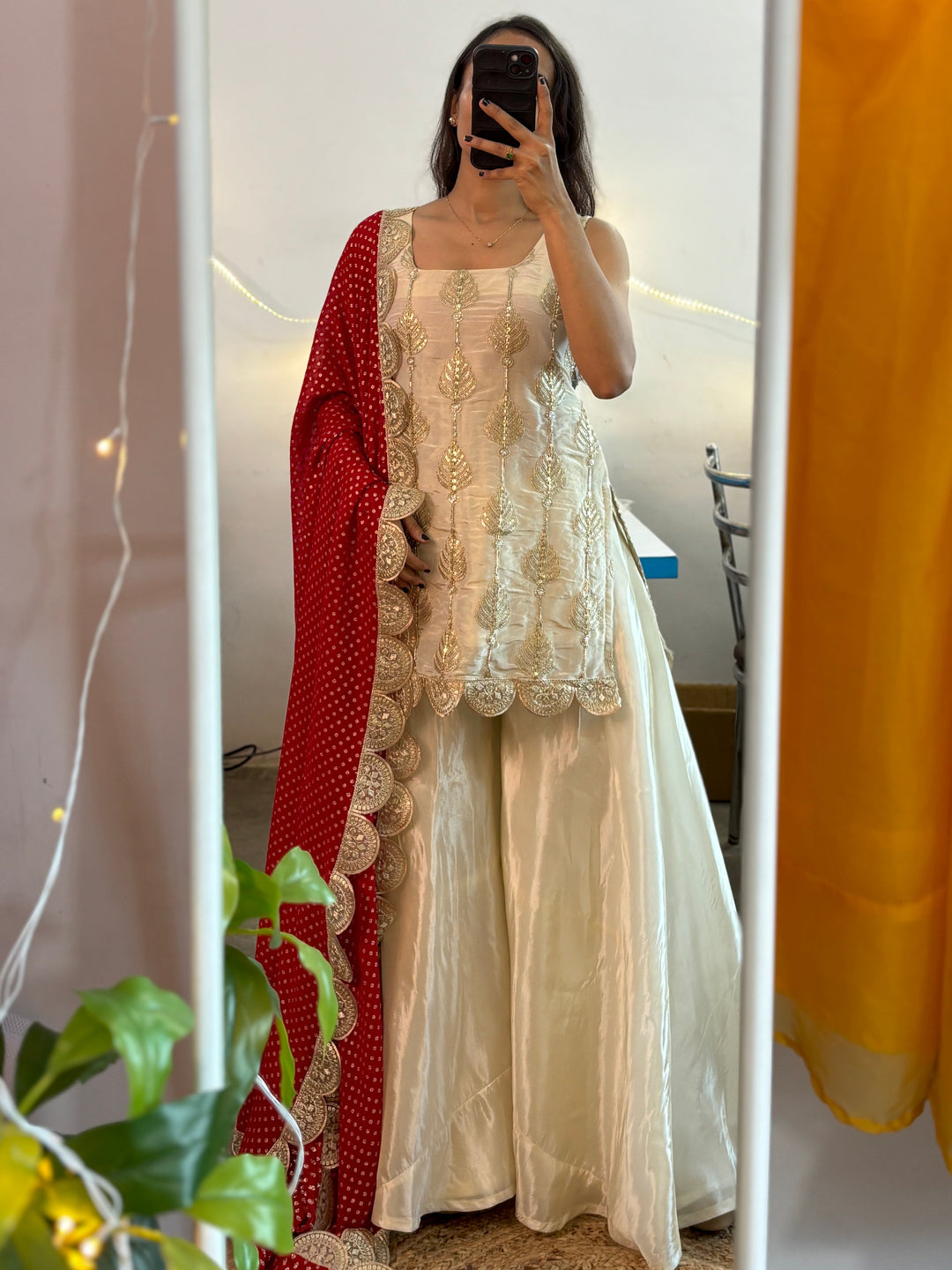 White sharara suit with Red Bandhej Dupatta,