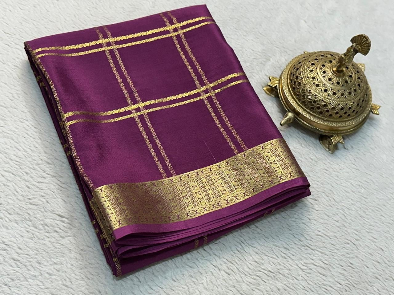 Classic Traditional Sarees: Exquisite Solid Hues with Grand Checks, Borders, and Pallus