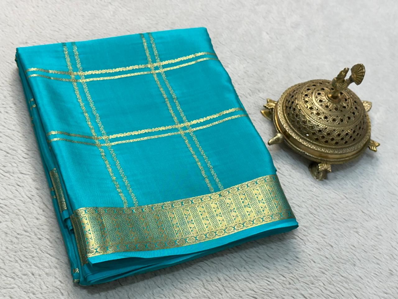 Classic Traditional Sarees: Exquisite Solid Hues with Grand Checks, Borders, and Pallus