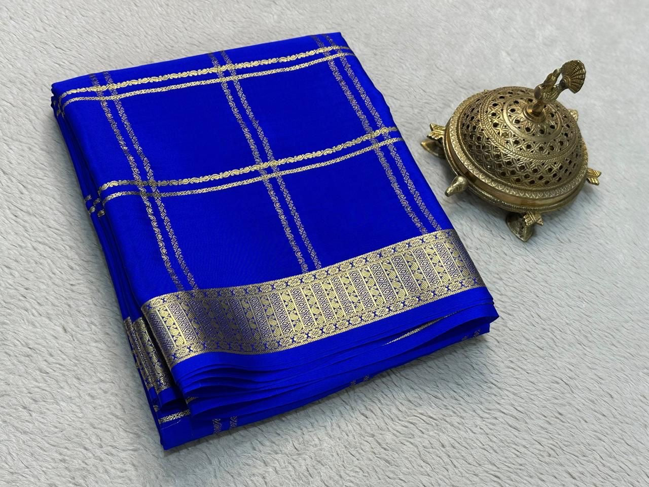 Classic Traditional Sarees: Exquisite Solid Hues with Grand Checks, Borders, and Pallus