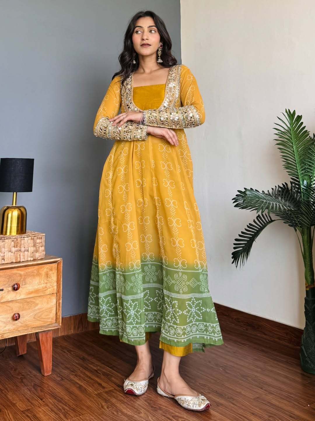Yellow anarkali kurta set with Mirror work