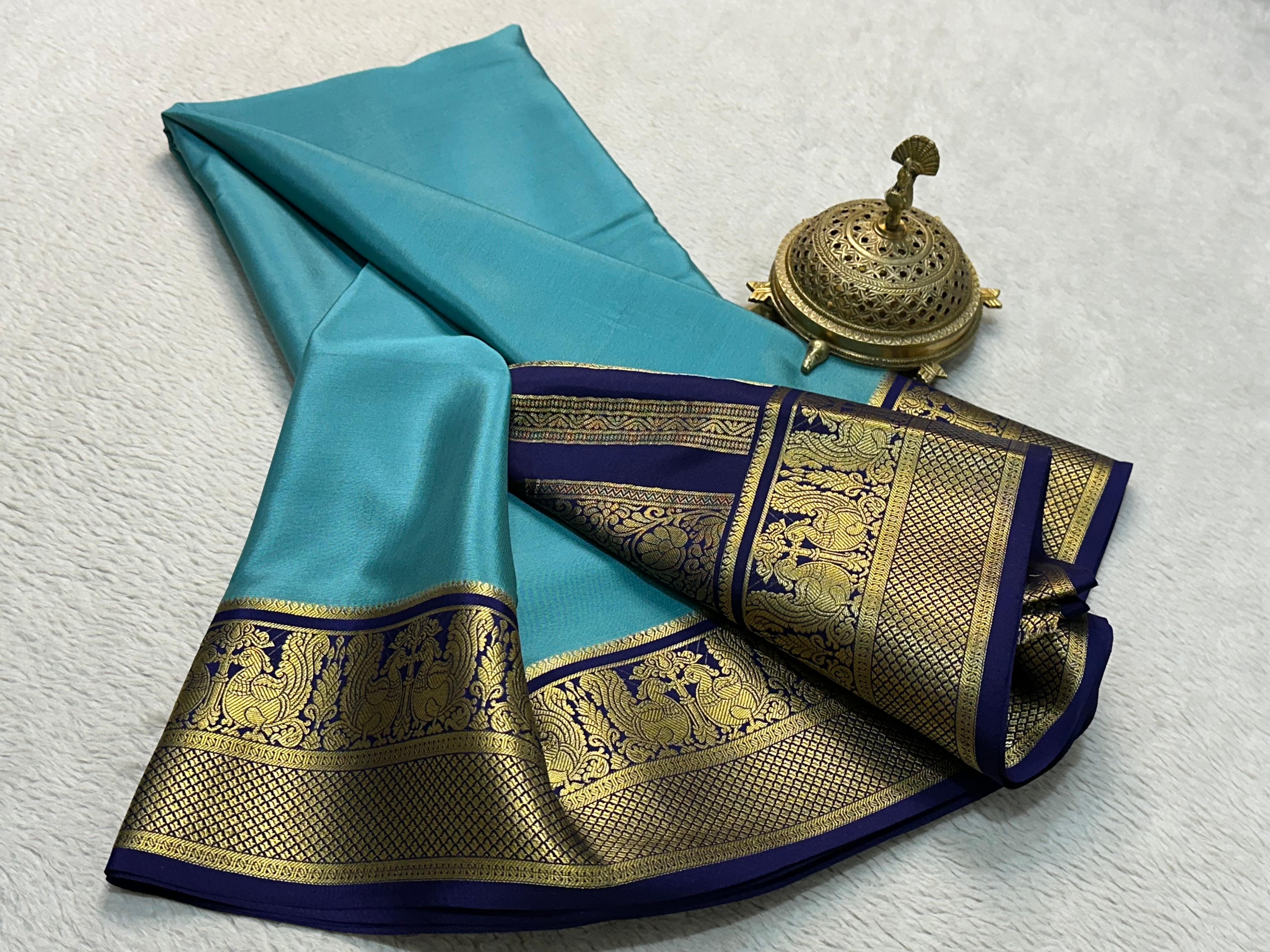 Grace the Occasion with Our Enchanting Rich Peacock Border Sarees
