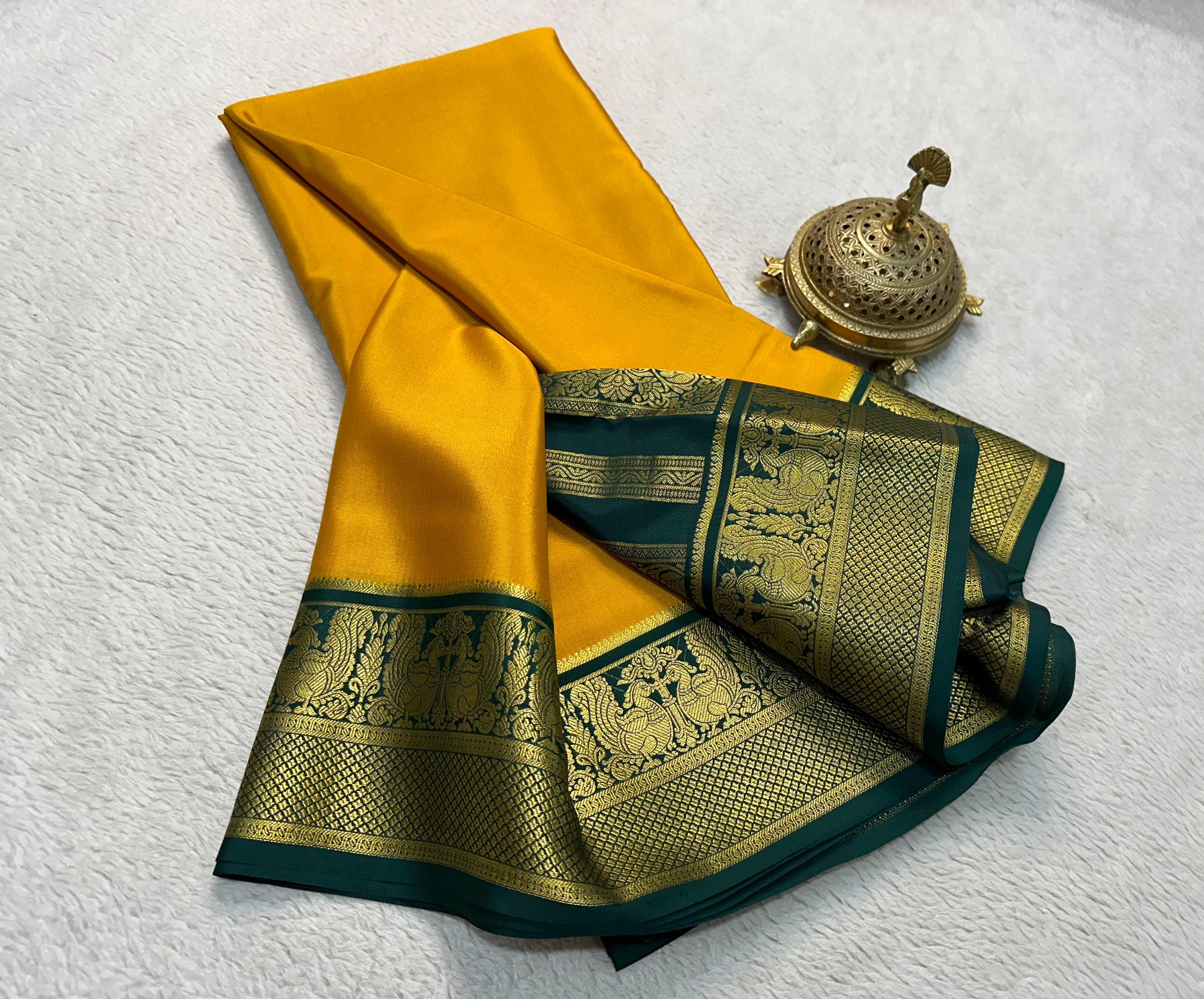 Grace the Occasion with Our Enchanting Rich Peacock Border Sarees