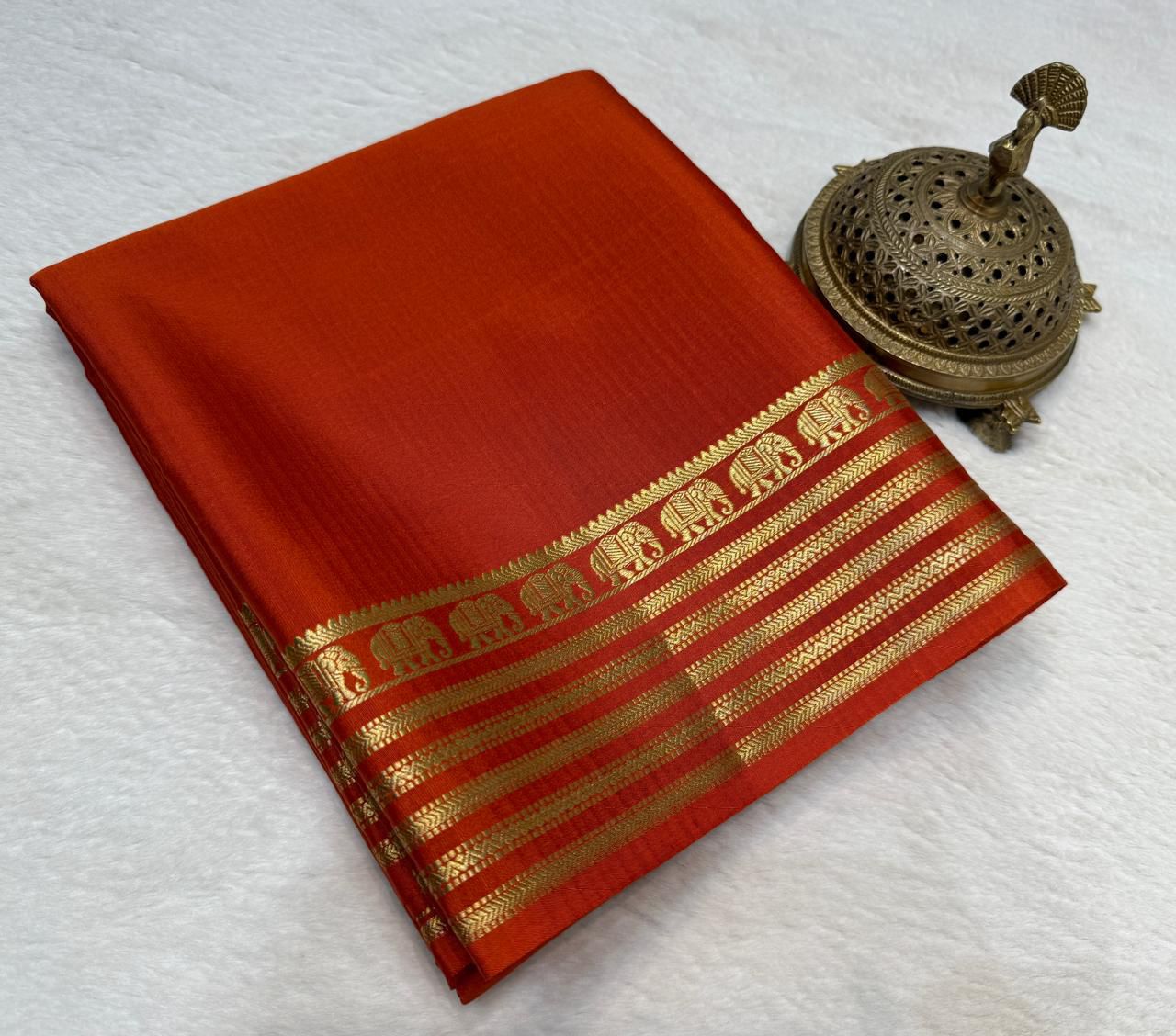 Orange Mysore silk saree with Traditional Gold Zari Elephant Border