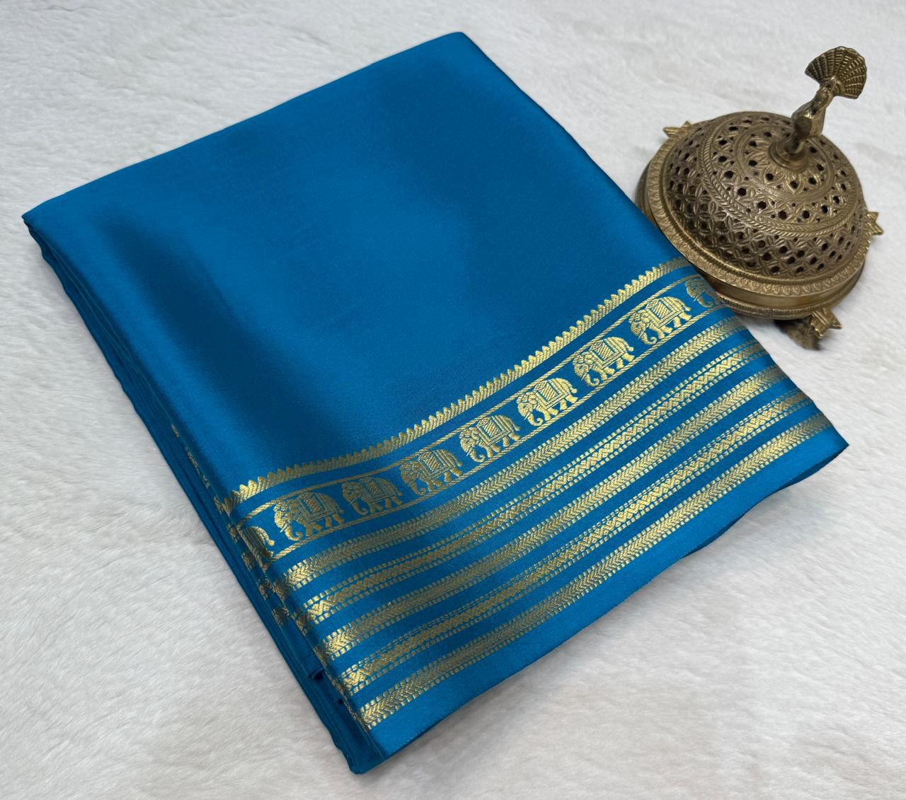 royal blue crepe silk saree with Gold Zari Elephant Border