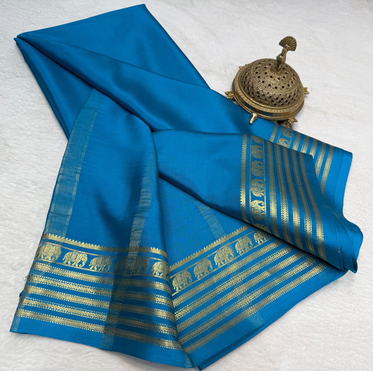 royal blue crepe silk saree with Gold Zari Elephant Border