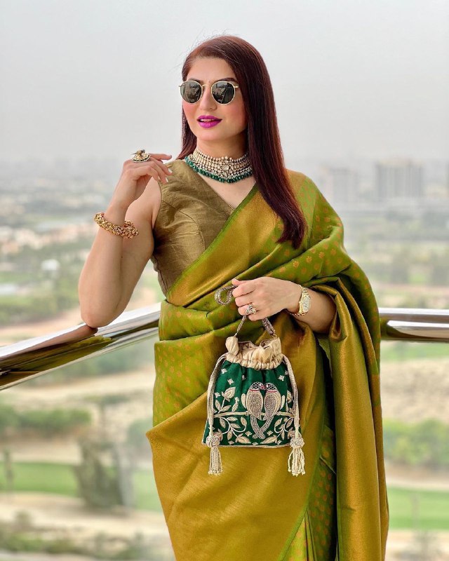Enchanting Green Festival Special Banarasi Soft Silk Saree, Embellished with Intricate Details
