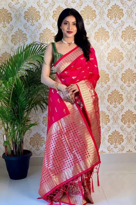 Luxurious Banarasi Pure Silk Pink Saree adorned with intricate golden zari designs