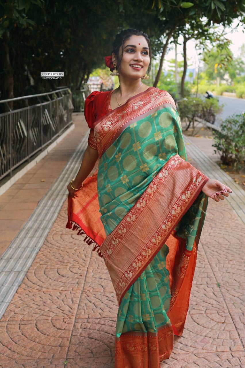 Luxurious Green & Red Banarasi Silk Saree, Embellished with Intricate Details