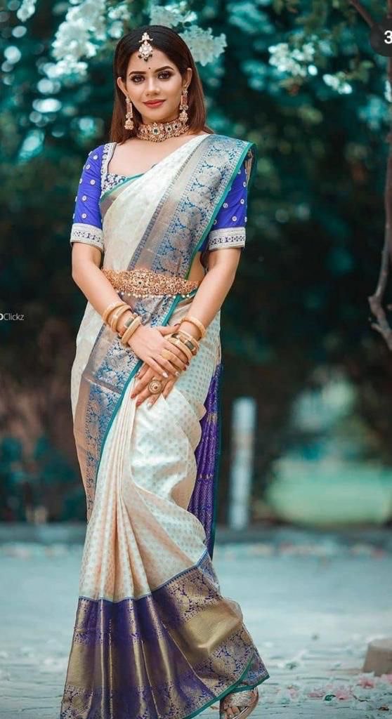 cream saree with blue pallu for women