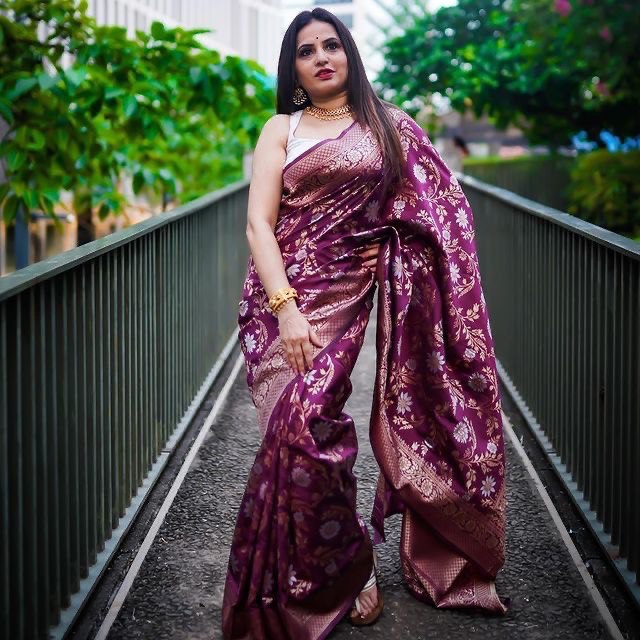 Exquisite wine-colored Banarasi soft silk saree featuring delicate floral designs