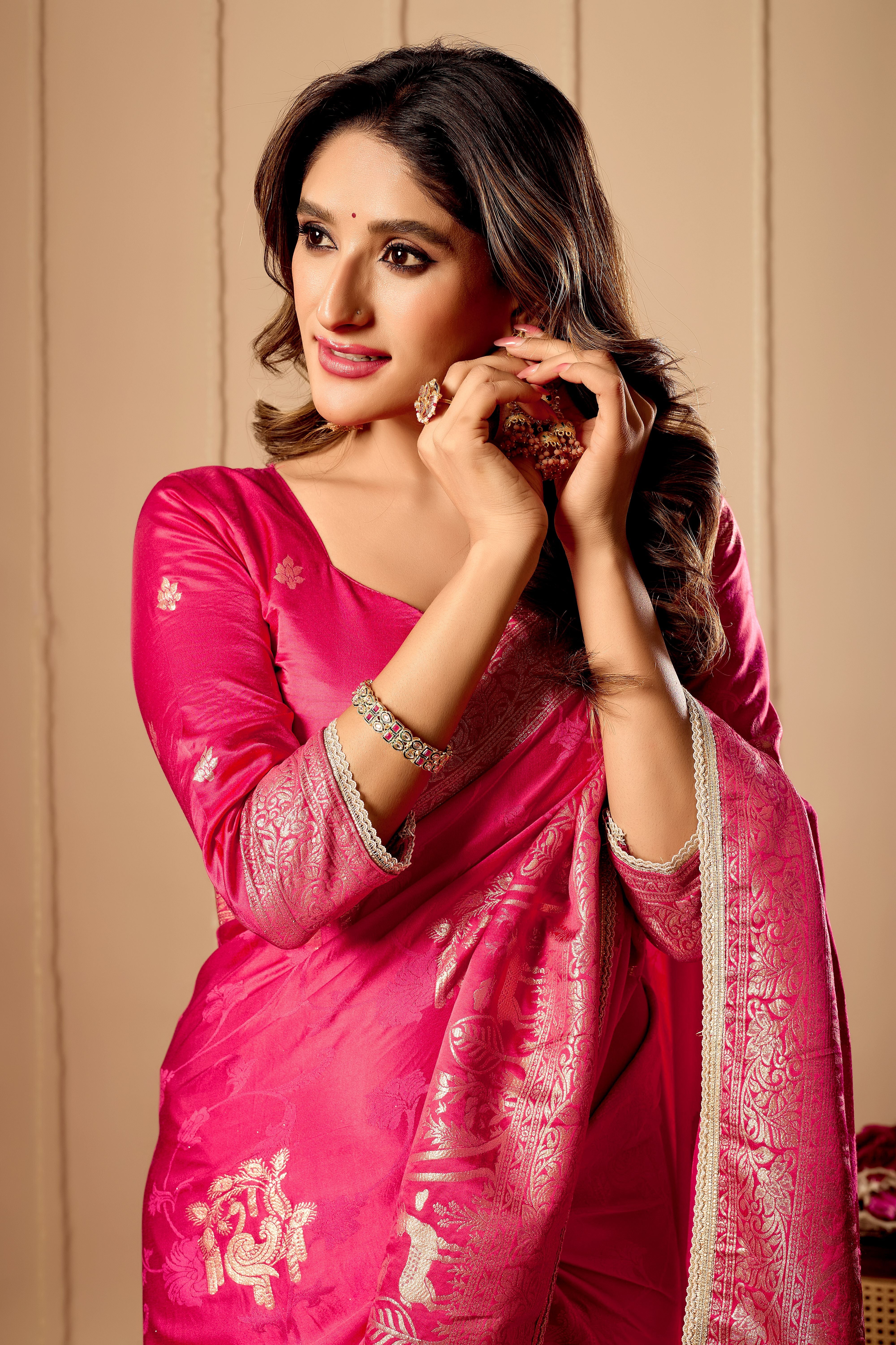 Vibrant Rani Pink  satin Silk Saree with Rich Gold Zari Weaving and Elegant Traditional Motifs
