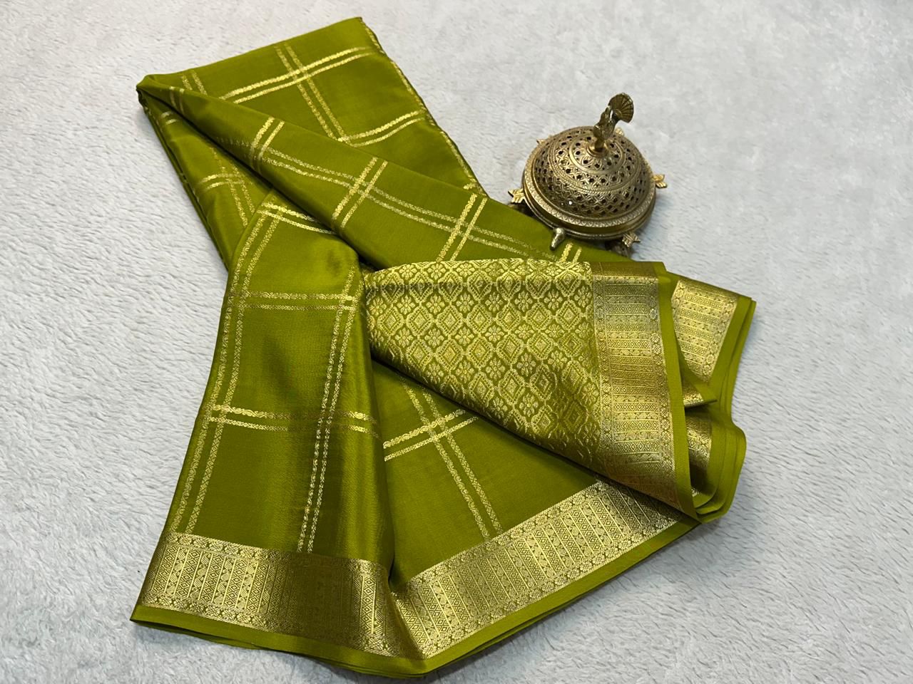 Classic Traditional Sarees: Exquisite Solid Hues with Grand Checks, Borders, and Pallus