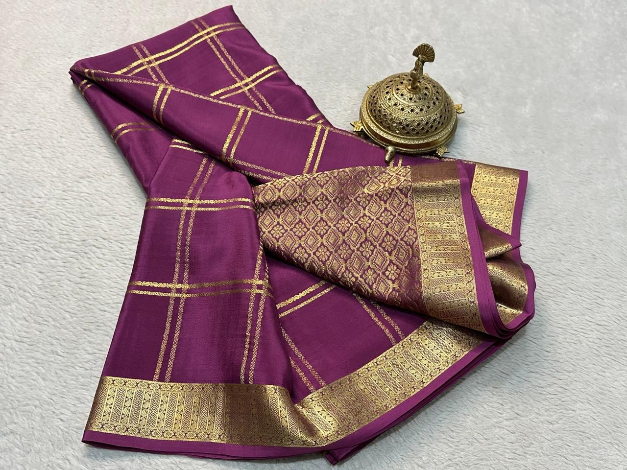 Classic Traditional Sarees: Exquisite Solid Hues with Grand Checks, Borders, and Pallus