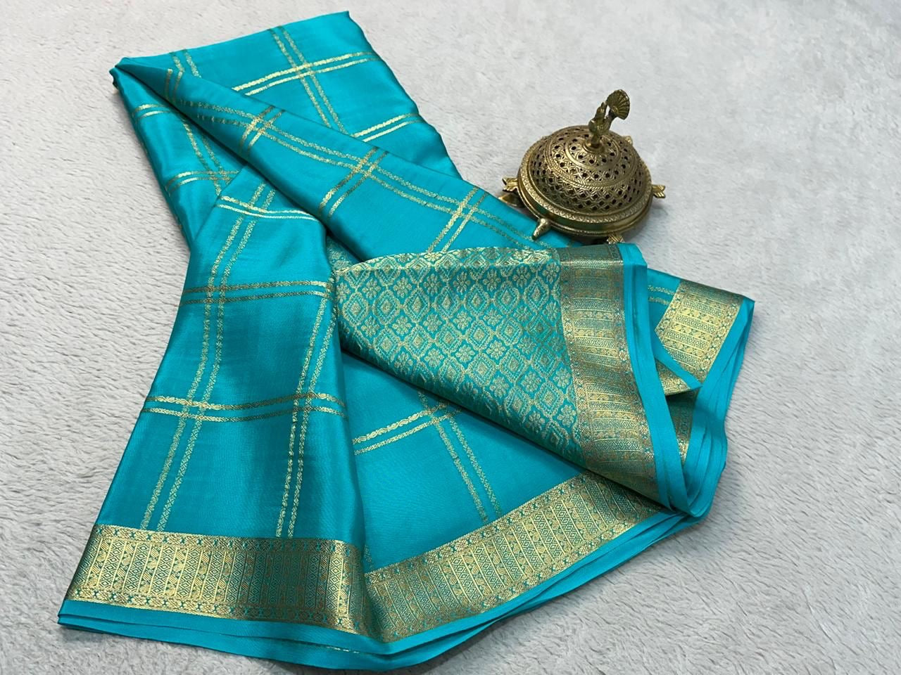 Classic Traditional Sarees: Exquisite Solid Hues with Grand Checks, Borders, and Pallus