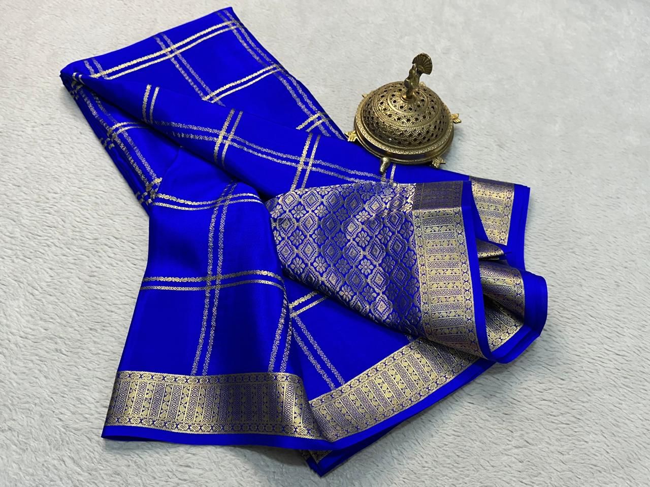Classic Traditional Sarees: Exquisite Solid Hues with Grand Checks, Borders, and Pallus
