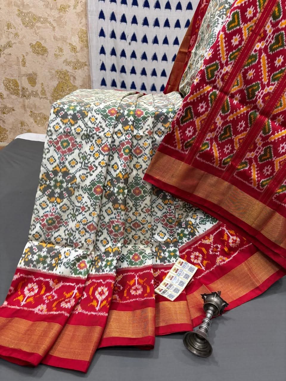 Handloom Patola Silk Saree White Multicolor Body with Red Ikat Border