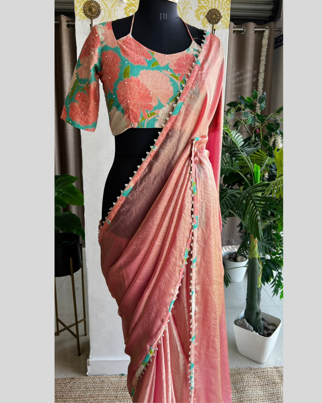 Peach Tissue silk saree with floral Hand Work Blouse.