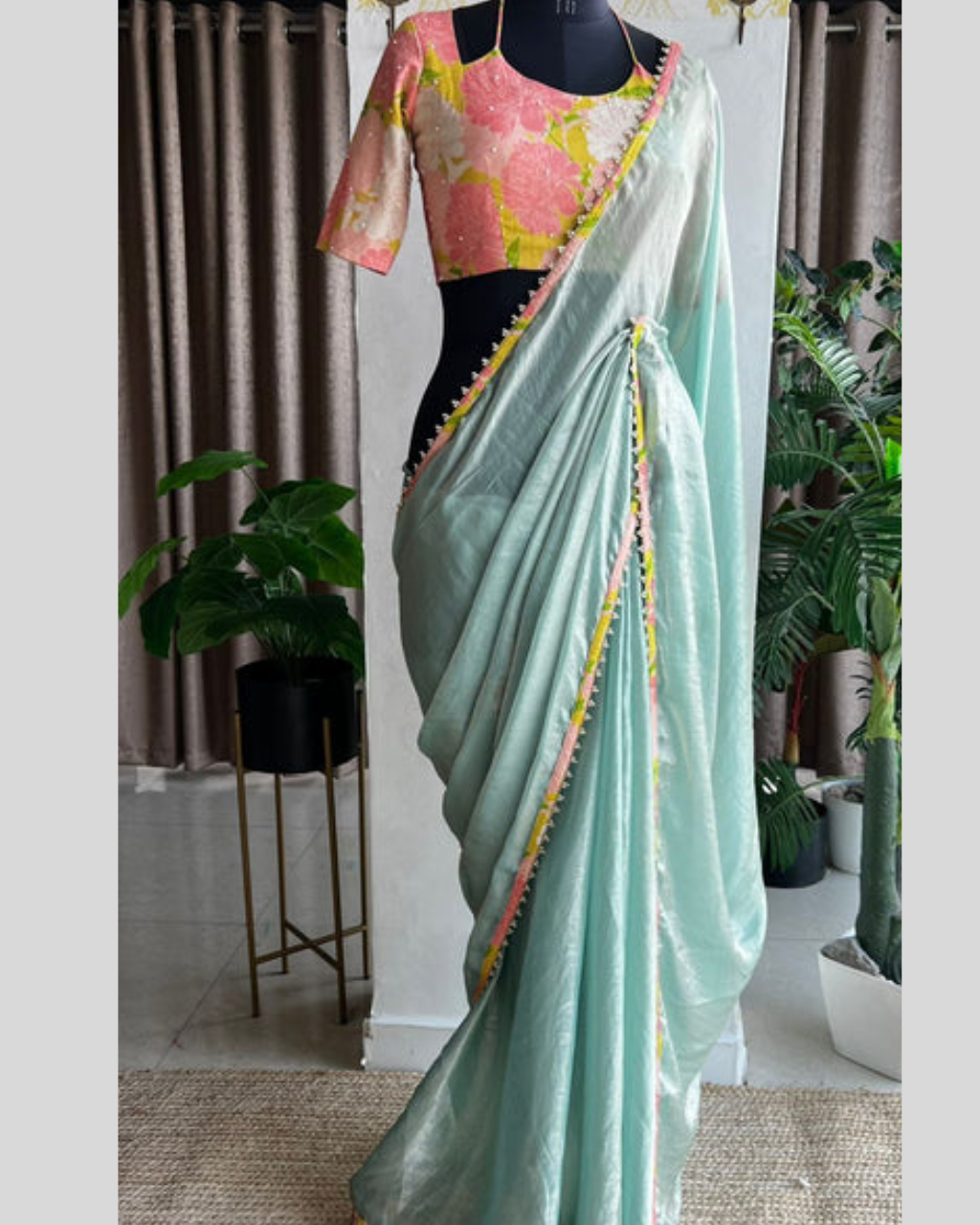 Sky Blue Tissue Silk Saree  With Floral Blouse.