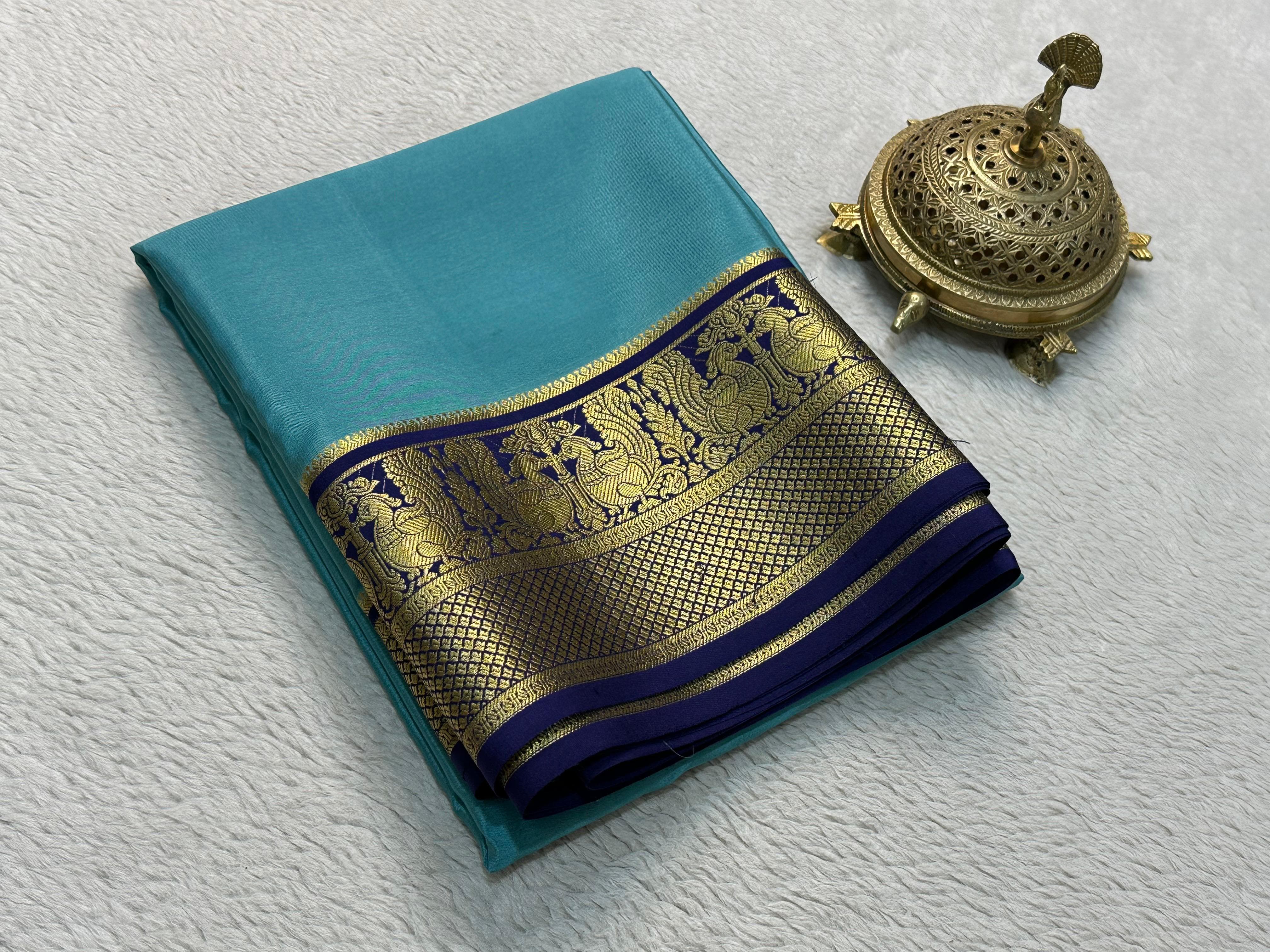 Grace the Occasion with Our Enchanting Rich Peacock Border Sarees