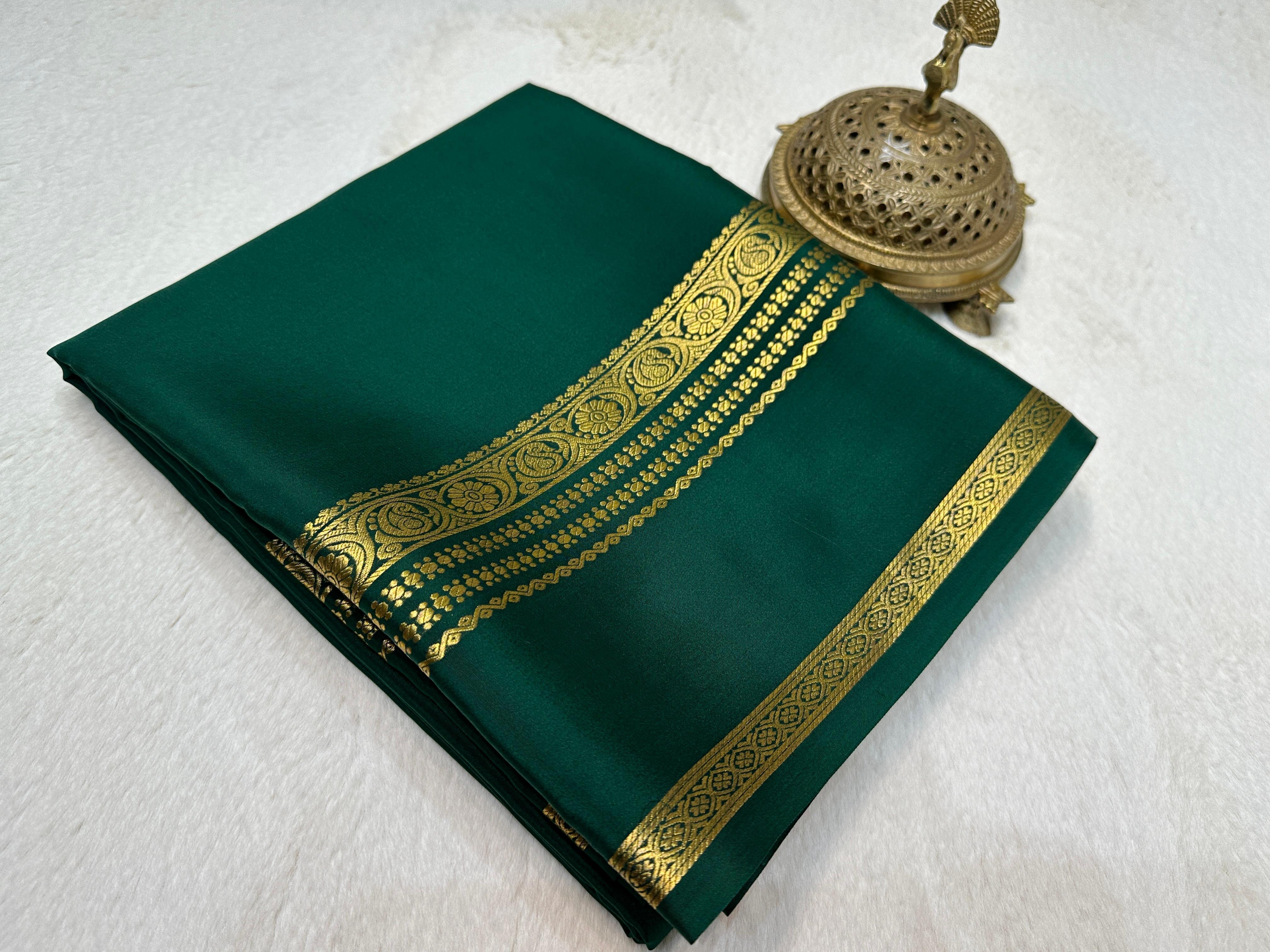 Bottle green plain four border pure mysore crepe silk saree