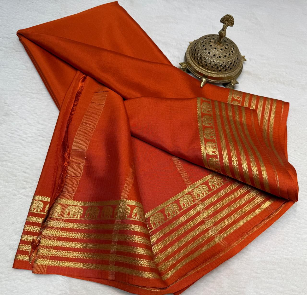 Orange Mysore silk saree with Traditional Gold Zari Elephant Border
