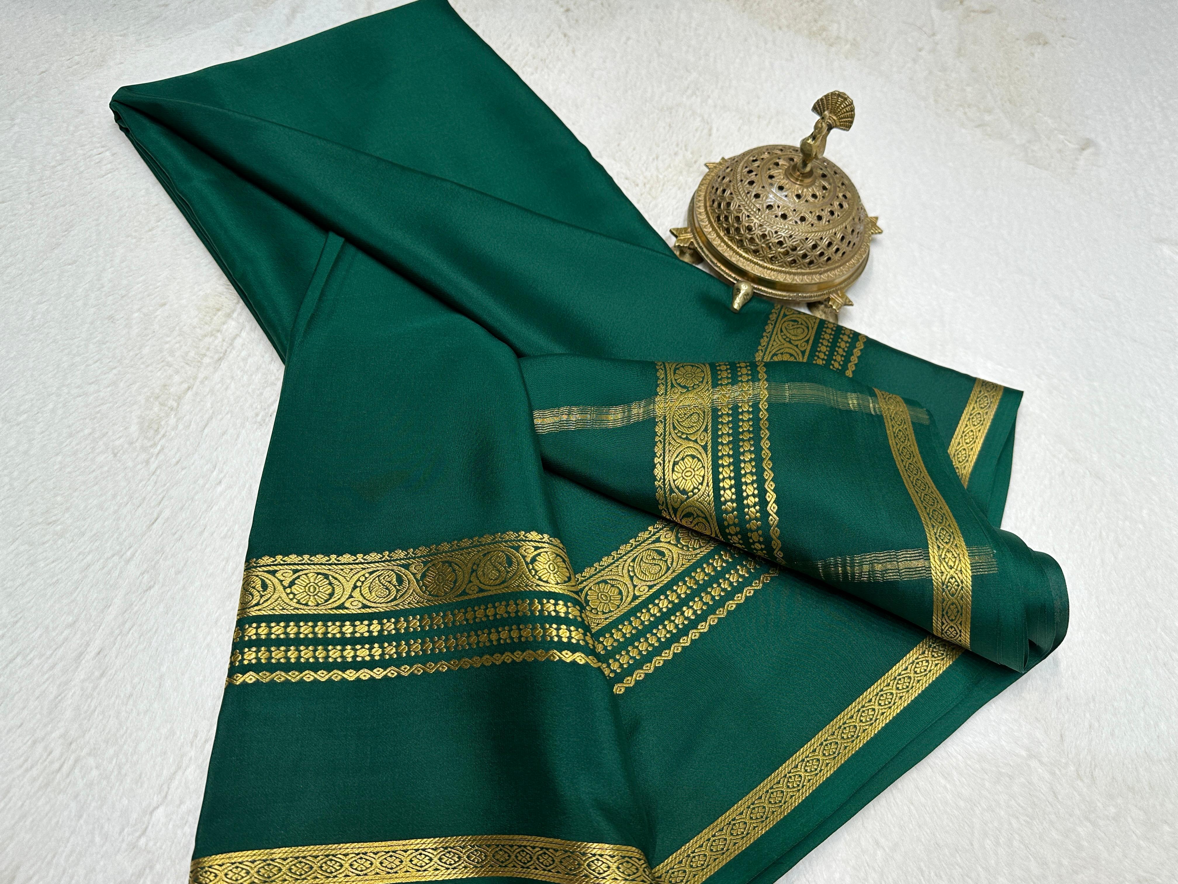 Bottle green plain four border pure mysore crepe silk saree