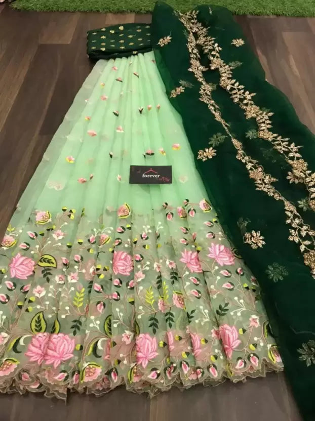 green heavy net embroidered semi stitched lehenga choli for wedding