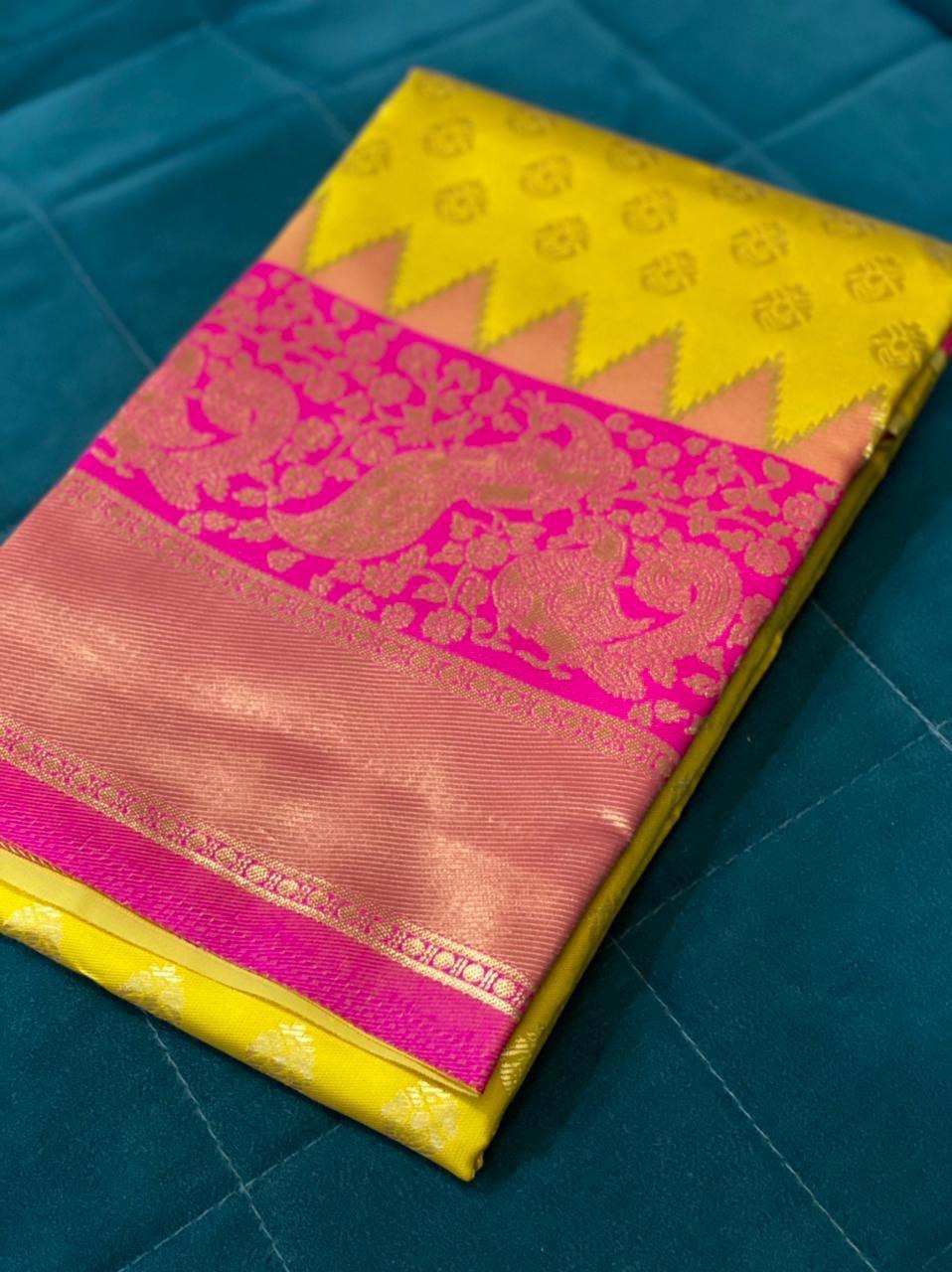 yellow peacock design saree