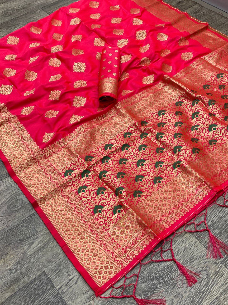 Maroon Red Banarasi Soft Silk Saree Enhanced with Detailed Golden Zari Weaving