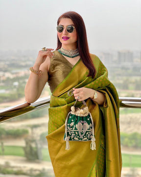 Luxurious Green Zari Woven Lichi Silk Banarasi Saree, a Symbol of Timeless Beauty