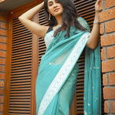 mint green cotton linen saree with embroidery work