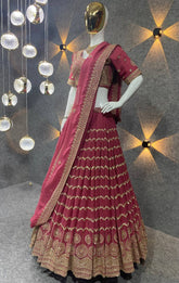 Rethink pink and Dark green￼ Colour Embroidered Attractive Party Wear Silk Lehenga choli has a Regular-fit and is Made From High-Grade Fabrics And Yarn