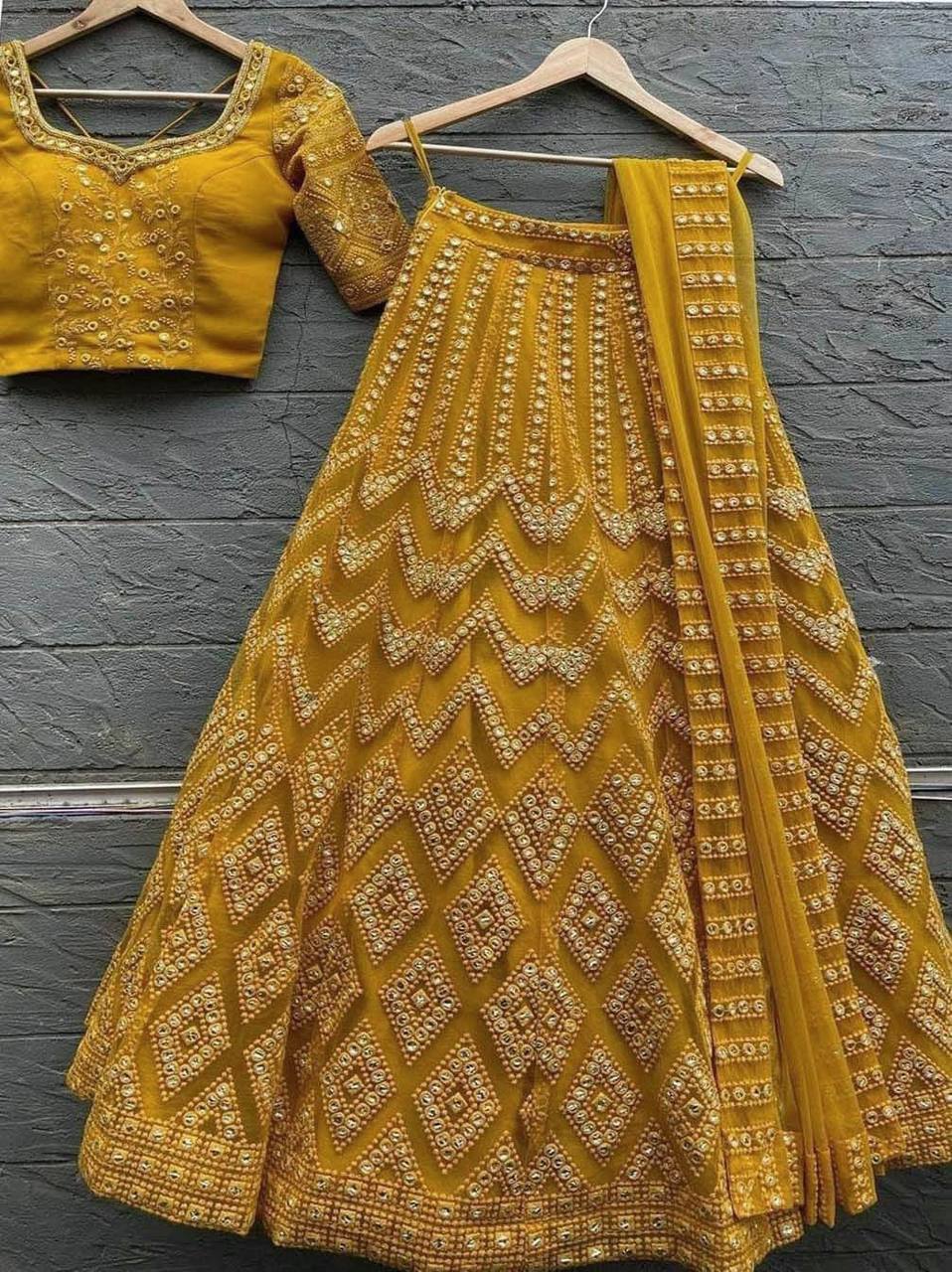 Golden Yellow Embroidered Attractive Party Wear Silk Lehenga choli has a Regular-fit and is Made From High-Grade Fabrics And Yarn LC 511